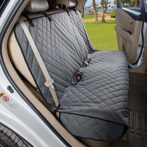 Grey colored car seat covers for dogs that have seat belt holes for humans.