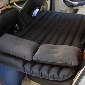 Lightweight Inflatable Air Bed Mattress for your Vehicle Backseat with two pillows.