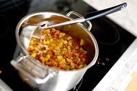 Soup in Cooking Pot.